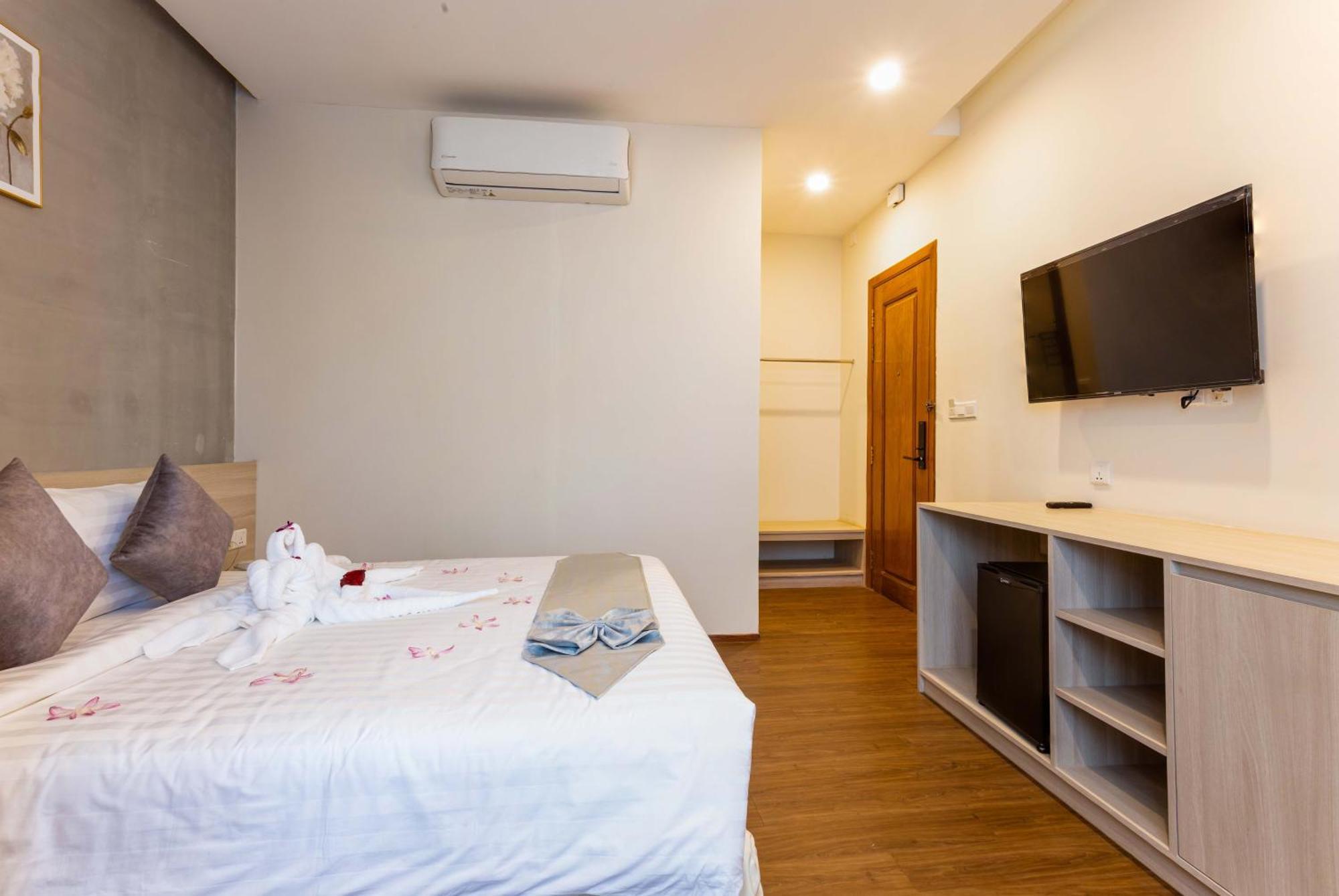 Joli Hotel Phnom Penh Habitación foto