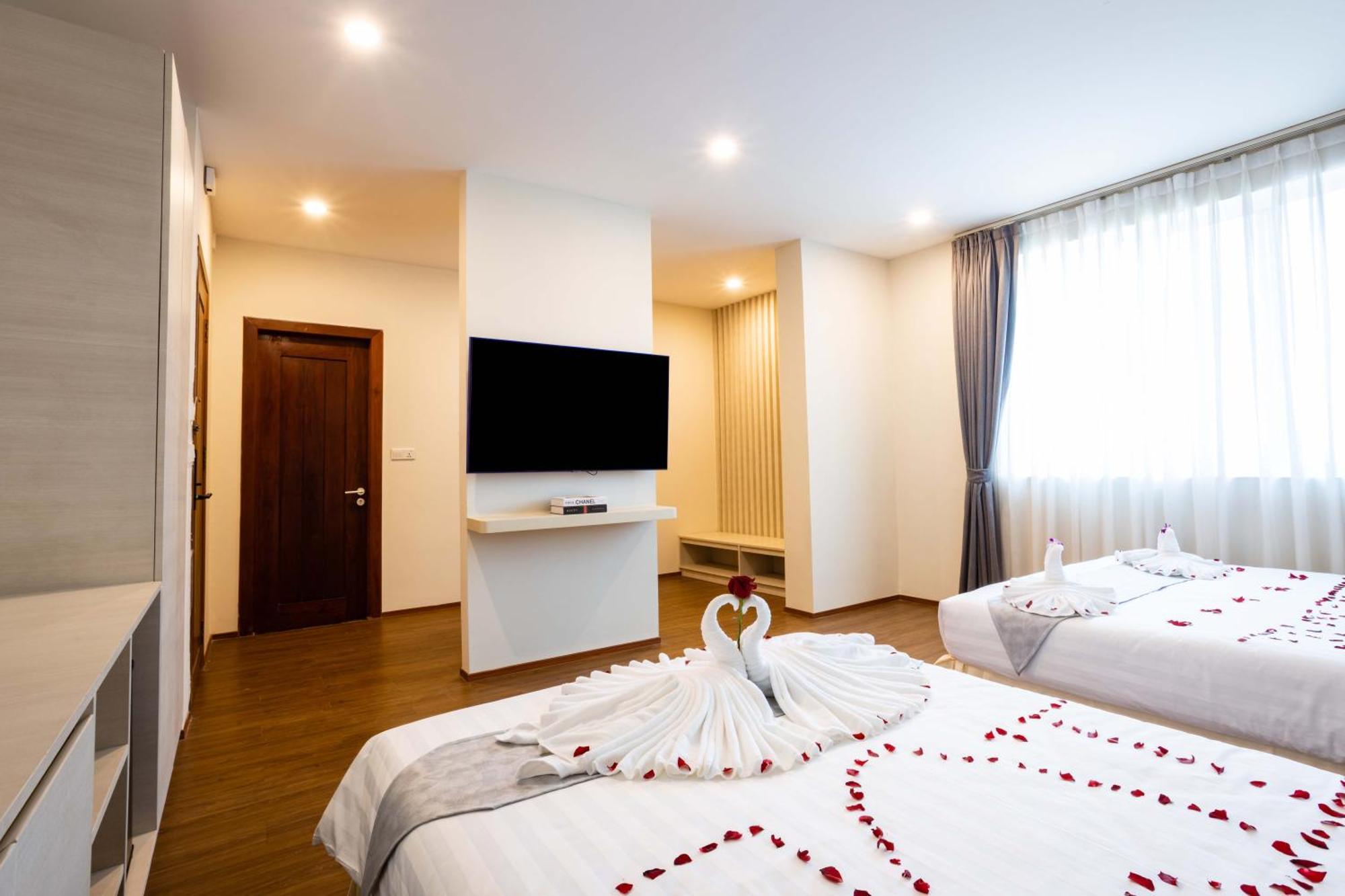 Joli Hotel Phnom Penh Habitación foto